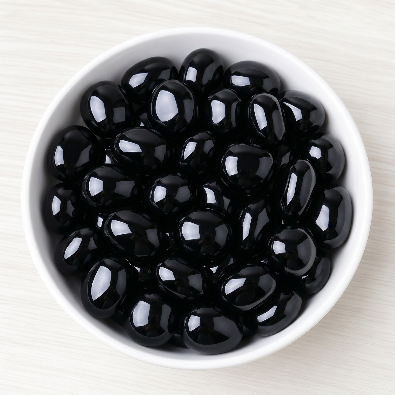 Schwarzer Obsidian Trommelstein